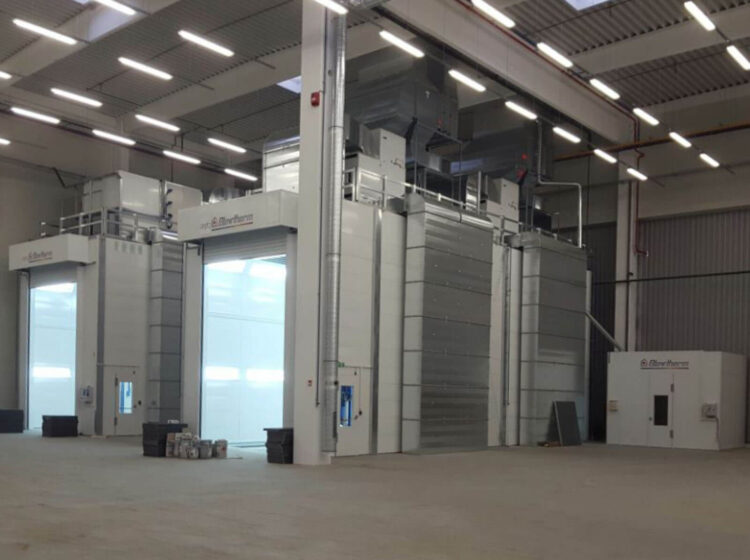 Painting electric buses in an air-conditioned booth